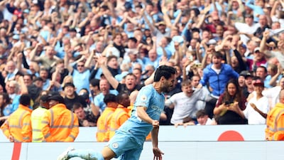Manchester City's Ilkay Gundogan celebrates scoring their third goal. Reuters