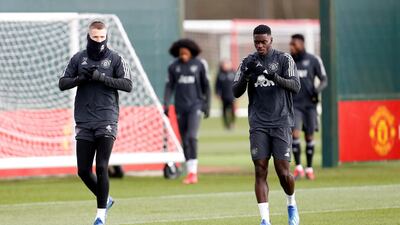 Manchester United's Scott McTominay and Axel Tuanzebe.