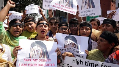 Women protesting in India this week to bring attention to rape and sexual violence cases. Raminder Pal Singh / EPA