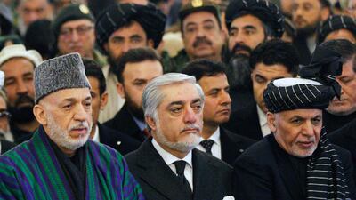 Afghanistan's president Mohammad Ashraf Ghani (right), Afghanistan's chief executive Abdullah Abdullah (centre), and Afghanistan former president, Hamid Karzai (left). EPA