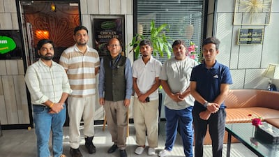 Indian consular official meets Indian seafarers rescued from UAE tanker Bahyah after an Iranian missile strike killed one crew member on July 14. Photo: Consulate General of India in Dubai on X