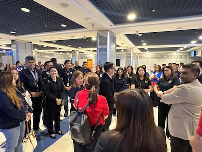 Mr Cacdac speaks to officials and volunteers during a charter repatriation flight of nationals from Fujairah. Photo: Philippine Consulate, Dubai