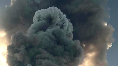 Smoke billows from the volcano on the Italian island of Stromboli. The news agency ANSA says that some 30 tourists jumped into the sea out of fear after a series of volcano erupted on the Sicilian island of Stromboli. Civil protection authorities said a hiker was confirmed killed by the eruptions. AP