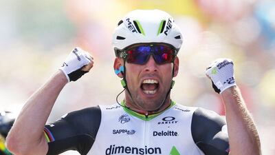 British sprinter Mark Cavendish crosses the finish line to win the first stage of the Tour de France first stage of the Tour de France cycling race from Mont Saint-Michel to Utah Beach, France, Saturday, July 2, 2016. Peter Dejong / AP Photo