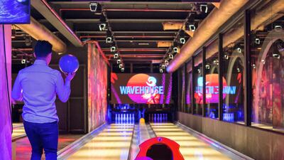 Lanes can be hired from Dh360 per hour (maximum six guests) or Dh60 per person per game (walk-in only). Shoes are included, while socks can be bought for an extra cost. Leslie Pableo / The National