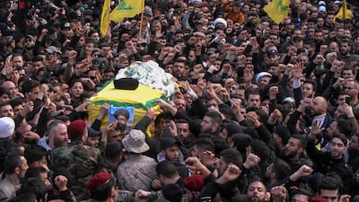 Supporters of Lebanon's Shiite Hezbollah movement carry coffins of fighters of the group killed in Syria, during their funeral procession in a suburb of the Lebanese capital Beirut. AFP
