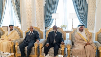 From right, Ahmed bin Al Sayegh, Minister of State; Altayeb Abdul Ghafour Abdul Wahab, Judge Sabri Shams Aldeen Mohamed, and Abdullah bin Touq, Secretary General of the UAE Cabinet, attend the swearing-in ceremony. Rashed Al Mansoori / Crown Prince Court - Abu Dhabi