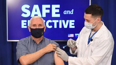 US Vice President Mike Pence receives the COVID-19 vaccine in the Eisenhower Executive Office Building in Washington, DC, December 18, 2020. / AFP / SAUL LOEB