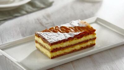 Dhibs millefeuille at Cafe Bateel layers ajwa, kholas or wannan date syrup between French pastry sheets.