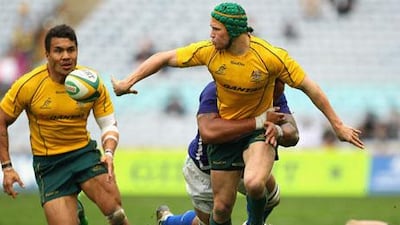 Unless an injury occurs, Matt Giteau, right, is out of Australia's Rugby World Cup plans.