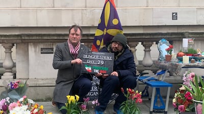 Richard Ratcliffe, whose wife Nazanin was held for years in an Iranian jail on trumped-up charges, visits Mr Beheshti outside the Foreign Office in London. Laura O'Callaghan / The National