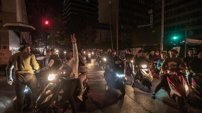 Anti-government protesters ride their motorcycles during a protest against the collapsing Lebanese currency and the price hikes of goods, in front the central bank in Beirut, Lebanon. EPA
