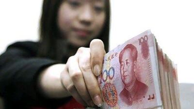 The use of yuan in financial transactions globally, including the UAE, has increased 17-fold since October 2010. Qilai Shen / Bloomberg News