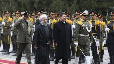 Iranian President Hassan Rouhani and Chinese President Xi Jinping review the honour guard during a welcoming ceremony in Tehran, Iran January 23, 2016. Reuters