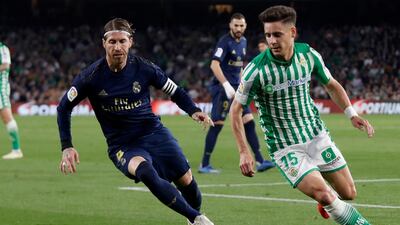 Sergio Ramos fights for the ball against Betis' Alex Moreno. AP Photo