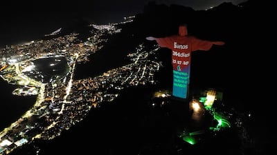 The Climate Clock, which indicates the alleged time left to act to limit global warming to 1.5°C, is projected onto the Christ the Redeemer statue, in Rio de Janeiro. AFP