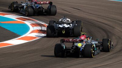 Lewis Hamilton, George Russell and AlphaTauri's Pierre Gasly in action during practice. Reuters