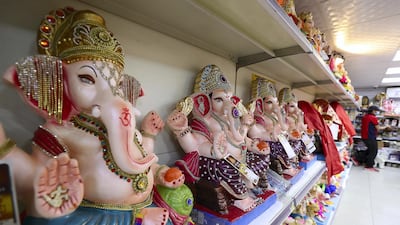 Colourful Ganesh statues made of plaster at the Madhoor store in Bur Dubai. Environmentalists are urging worshippers to choose more eco-friendly idols to immerse in the sea. Pawan Singh / The National