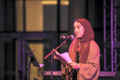 Maitha AlSuwaidi, a student at NYUAD, read a long poem that made the connection between family roots and our sense of “home". Courtesy Nikith Nath