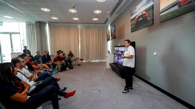 The drivers receive a briefing before moving out