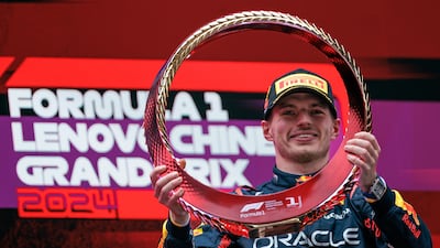 Red Bull Racing driver Max Verstappen of the Netherlands celebrates with his trophy after winning the Formula One Chinese Grand Prix, in Shanghai, China, 21 April 2024. The 2024 Formula 1 Chinese Grand Prix is held at the Shanghai International Circuit racetrack on 21 April after a five-year hiatus. EPA / ALEX PLAVEVSKI