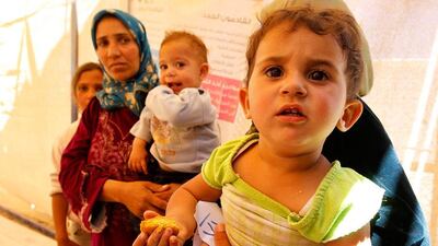 Syrian refugees wait for treatment at a medical centre at the Al Zaatri refugee camp in Mafraq, Jordan. Muhammad Hamed / Reuters