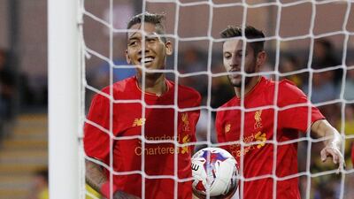 Liverpool’s Roberto Firmino celebrates. Darren Staples / Reuters