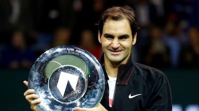 Roger Federer poses with the Rotterdam Open trophy after his victory in unday's final against Grigor Dimitrov. Michael Kooren / Reuters