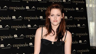 Kristen Stewart, in jeans and a cami, attends the 'Twilight' photocall at Hotel ME on October 27, 2008 in Madrid, Spain.