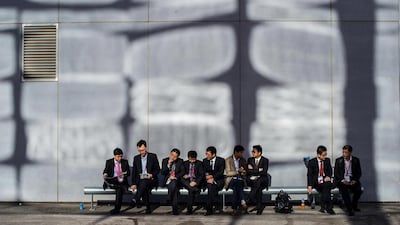 Visitors to the Mobile World Congress take a break before perusing the newest gadgets being showcased by more than 2,000 companies. David Ramos / Getty Images