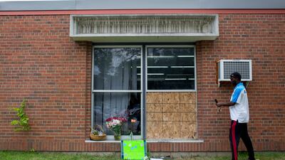 The damage outside of the Dar Al Farooq Islamic Center in Bloomington, Minnesota, after an explosion damaged a room and shattered windows as worshippers prepared for morning prayers