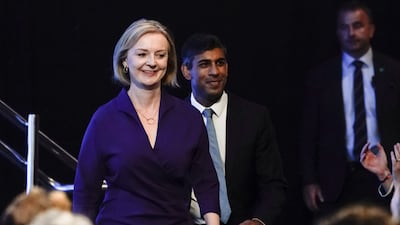 Liz Truss arriving at the Queen Elizabeth II Centre in London on Monday, where she was declared the winner of the Conservative Party leadership race with Rishi Sunak (centre). AP