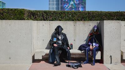 People in cosplay sit outside Comic-Con International in San Diego, California. EPA