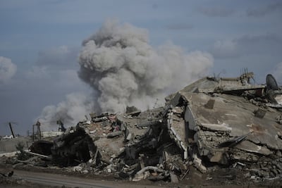 The Israeli military demolishes a house east of Gaza city. AP