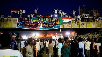 Sudanese demonstrators gather outside the military headquarters in the capital Khartoum on May 20, 2019. Sudan's army rulers and protesters resume talks Monday to finalise the makeup of a new ruling body after overnight negotiations remained deadlocked following a "dispute" over who should lead it. AFP