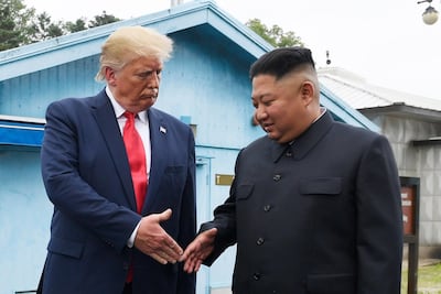 North Korean leader Kim Jong-un and President Donald Trump prepare to shake hands at the border village of Panmunjom in the Demilitarised Zone, South Korea. AP