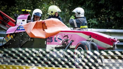 The wreck of Anthoine Hubert's car is removed during the Formula 2 race at the Spa-Francorchamps. EPA