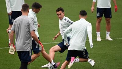 Spain defender Jose Gaya fights for a ball with teammates during their training session at Las Rozas. AFP