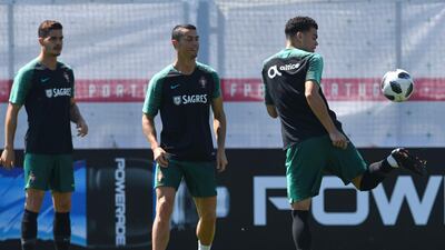 From right: Portugal's Pepe, Cristiano Ronaldo and Andre Silva during training in Kratovo, Moscow on June 17, 2018. Francisco Leong / AFP