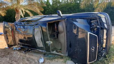 The driver of this Lexus flipped the car in trying to avoid hitting an animal on the road, while driving towards Hamriyah in Sharjah. Courtesy Sharjah Police