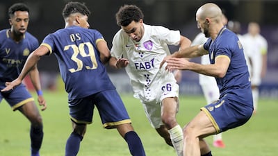 Al AIn's Omar Yaisien goes on the attack against Al Nassr. Chris Whiteoak / The National
