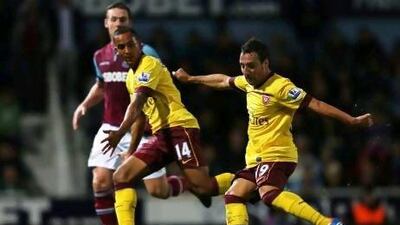 Arsenal's Santi Cazorla can play on either wing or in a more central role.