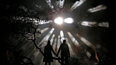 Visitors pose for a photograph during the Enchanted Christmas event at the Forestry Commission’s National Arboretum in Westonbirt, Tetbury, England. Eddie Keogh / Reuters
