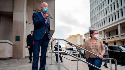 Democratic presidential candidate Joe Biden speaks outside of the state building after voting in Wilmington, Delaware,. AFP