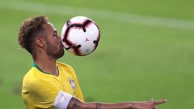 Neymar controls the ball during the match at King Abdullah Stadium. AP Photo