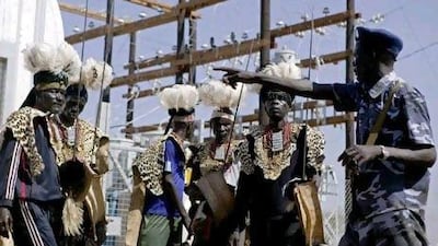 Members of the Taposa tribe prepare for the ceremonial opening of a US-funded power plant in the southern Sudanese town of Kapoeta. Pete Muller / AP Photo