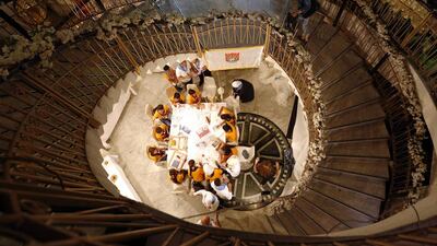Syrian children make crafts at the opening of the fourth International Building Technology Exhibition in Damascus, Syria. Youssef Badawi / EPA