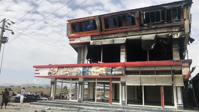 A view of a damaged house after a fire ripped through several fuel tankers. EPA