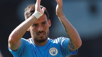 Manchester City's David Silva applauds fans after the match. Reuters