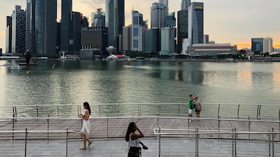 Singapore's central business district skyline. Growth outlook has been cut as US-China trade war bites. Reuters